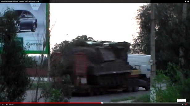 9A310M1 Buk-M1 TELAR transported on civilian truck.