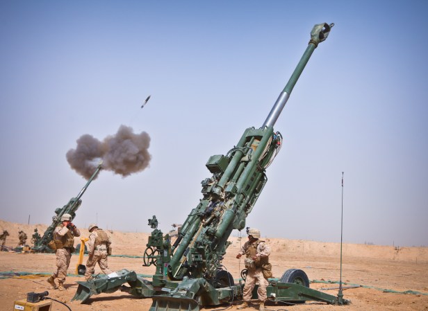 charlie_battery2c_1st_battalion2c_12th_marine_regiment2c_fire_an_m982_excalibur_round_from_an_m777_howitzer